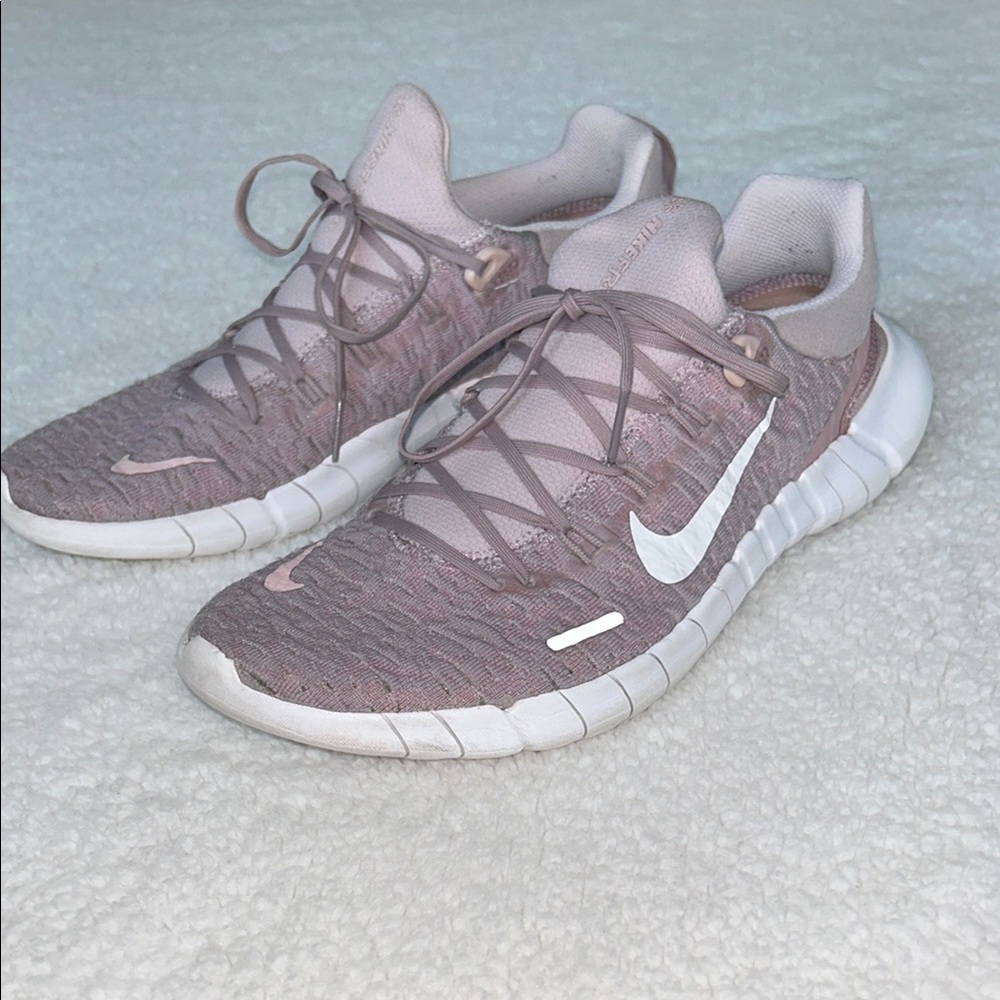 Nike Pink and White Athletic Shoes with Breathable Fabric